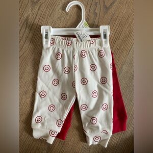 Baby pants first impressions Macys red and smily face size 0-3 months